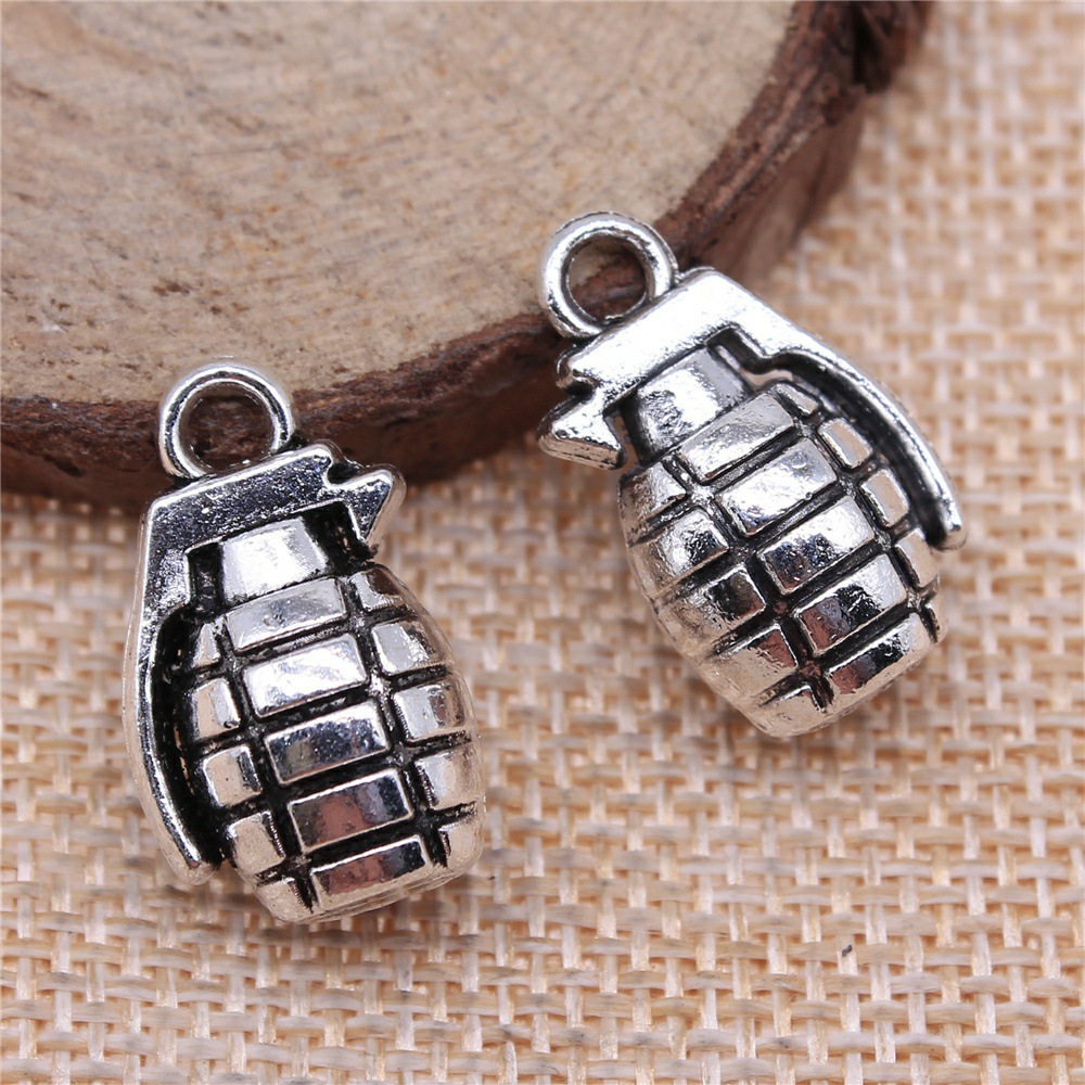 8 breloques en forme de pistol - Vintage Fashion Stores avis et prix
